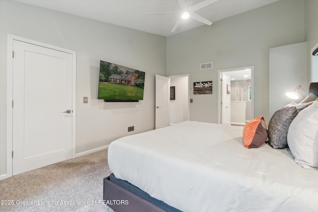 3901 W Howe Rd, Dewitt, MI 48820 - bedroom featuring carpet floors, connected bathroom, and ceiling fan