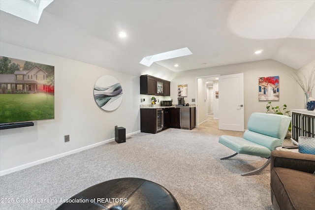 3901 W Howe Rd, Dewitt, MI 48820 - living room with a skylight, light carpet, bar, recessed lighting, and vaulted ceiling