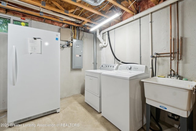 3901 W Howe Rd, Dewitt, MI 48820 - washroom with electric panel and independent washer and dryer