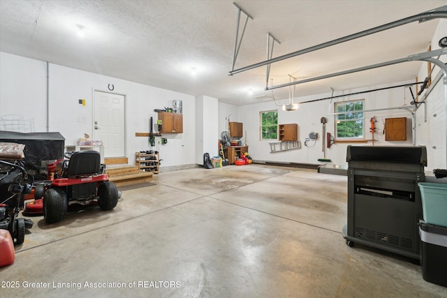 3901 W Howe Rd, Dewitt, MI 48820 - garage featuring a garage door opener