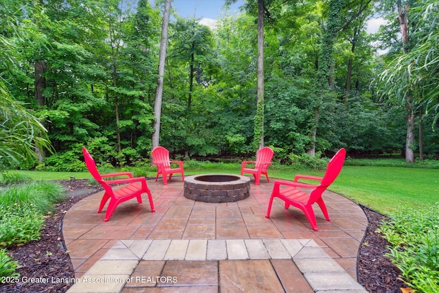 3901 W Howe Rd, Dewitt, MI 48820 - view of patio featuring a fire pit