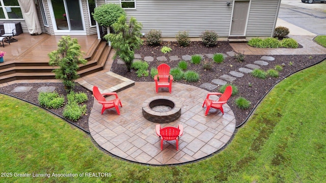 3901 W Howe Rd, Dewitt, MI 48820 - view of yard with a fire pit, a wooden deck, and a patio