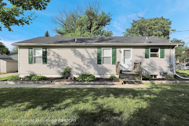 1015 Lake Lansing Rd, Lansing, MI 48906 - view of front of home with a front lawn