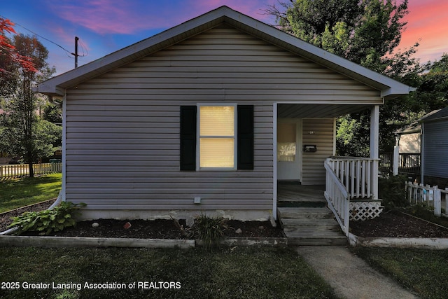 1015 Lake Lansing Rd, Lansing, MI 48906 - view of front of property featuring covered porch
