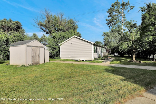 1015 Lake Lansing Rd, Lansing, MI 48906 - view of green lawn featuring a storage shed