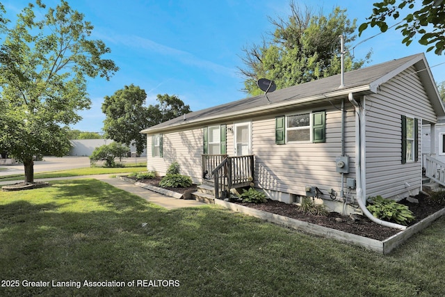 1015 Lake Lansing Rd, Lansing, MI 48906 - view of front facade with a front yard