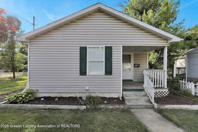 1015 Lake Lansing Rd, Lansing, MI 48906 - view of front of property with covered porch