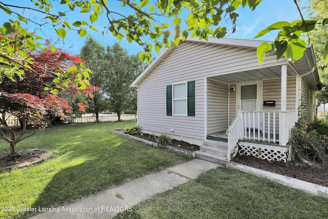 1015 Lake Lansing Rd, Lansing, MI 48906 - bungalow featuring covered porch