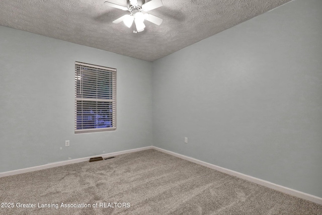 1015 Lake Lansing Rd, Lansing, MI 48906 - empty room featuring a textured ceiling, carpet flooring, and ceiling fan