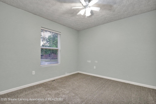 1015 Lake Lansing Rd, Lansing, MI 48906 - empty room featuring a textured ceiling, carpet floors, and a ceiling fan