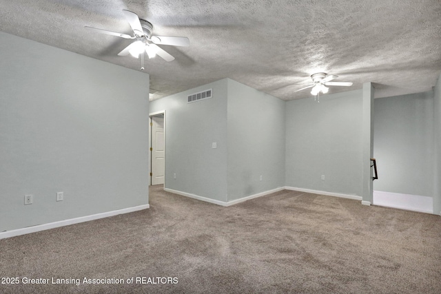 1015 Lake Lansing Rd, Lansing, MI 48906 - carpeted spare room with a ceiling fan and a textured ceiling