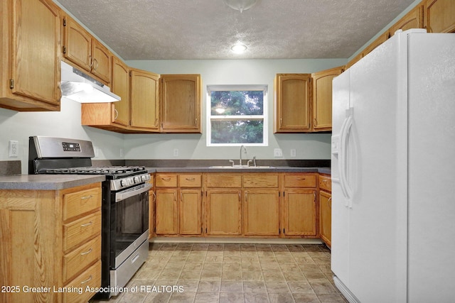 1015 Lake Lansing Rd, Lansing, MI 48906 - kitchen with white fridge with ice dispenser, stainless steel gas stove, under cabinet range hood, a textured ceiling, and dark countertops