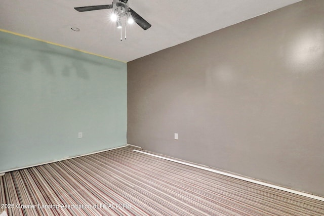1015 Lake Lansing Rd, Lansing, MI 48906 - unfurnished room with a ceiling fan and carpet