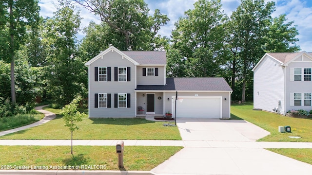 1118 River Oaks Dr, Dewitt, MI 48820 - traditional-style home featuring an attached garage, concrete driveway, and a front yard