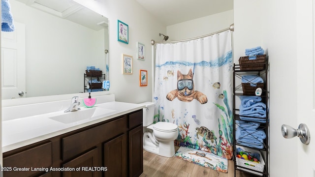 1118 River Oaks Dr, Dewitt, MI 48820 - bathroom featuring vanity, wood finished floors, and curtained shower