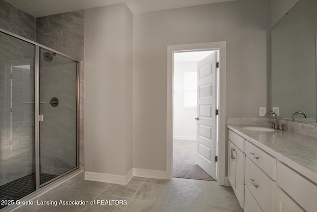616 Magenta Ct, Haslett, MI 48840 - full bathroom with vanity, a stall shower, and tile patterned floors