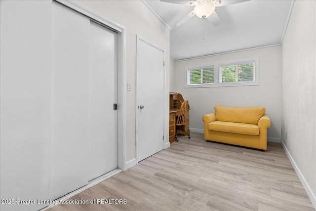 17 Charles E Pl, Battle Creek, MI 49015 - sitting room with wood finished floors, a ceiling fan, crown molding, and vaulted ceiling