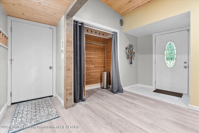 17 Charles E Pl, Battle Creek, MI 49015 - entrance foyer featuring wooden ceiling, light wood-style flooring, and wooden walls