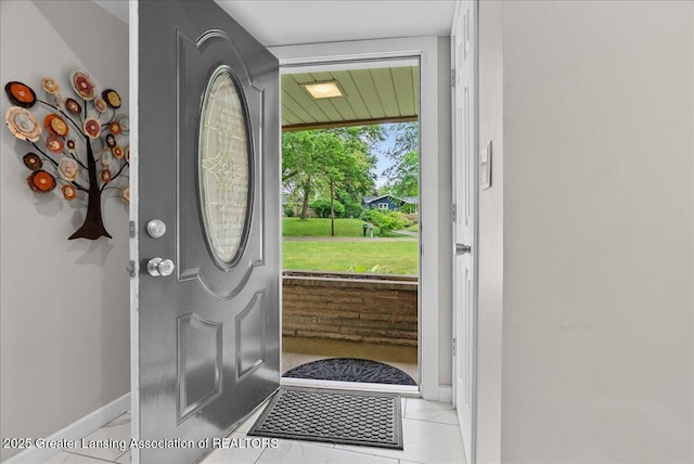 17 Charles E Pl, Battle Creek, MI 49015 - entryway featuring baseboards and tile patterned flooring
