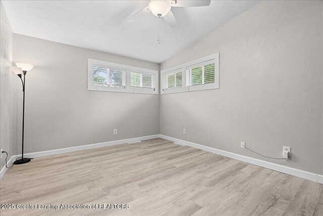 17 Charles E Pl, Battle Creek, MI 49015 - unfurnished room featuring a ceiling fan, light wood finished floors, and vaulted ceiling