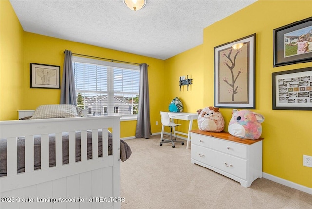 10889 Pointe W Blvd, Grand Ledge, MI 48837 - carpeted bedroom featuring baseboards and a textured ceiling
