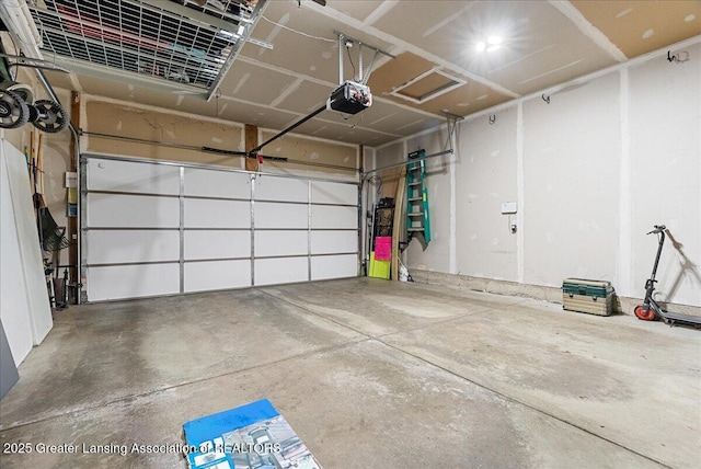 10889 Pointe W Blvd, Grand Ledge, MI 48837 - garage with a garage door opener
