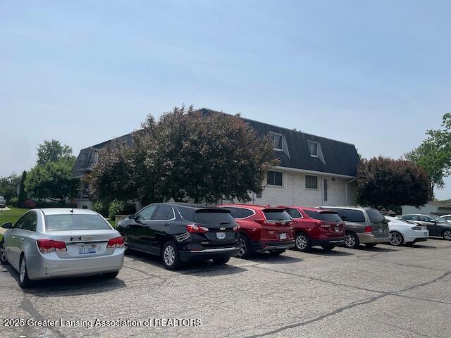 5535 W St Joe Hwy Unit B12, Lansing, MI 48917 - view of uncovered parking lot