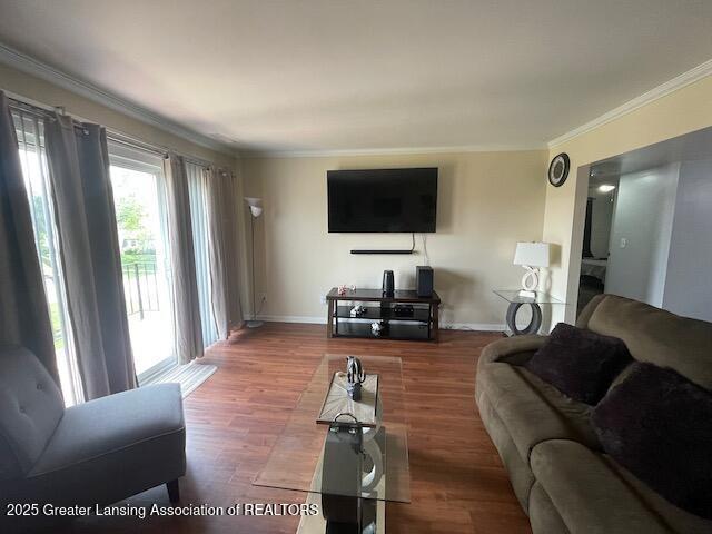 5535 W St Joe Hwy Unit B12, Lansing, MI 48917 - living room with crown molding and wood finished floors