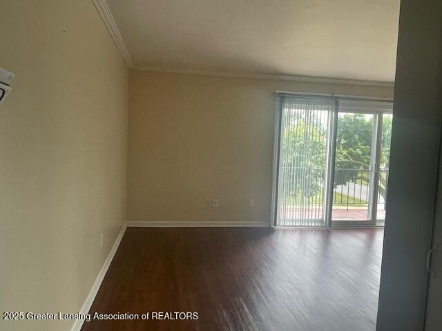 5535 W St Joe Hwy Unit B12, Lansing, MI 48917 - empty room with crown molding and wood finished floors