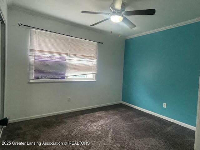 5535 W St Joe Hwy Unit B12, Lansing, MI 48917 - unfurnished room with ornamental molding, dark colored carpet, and ceiling fan