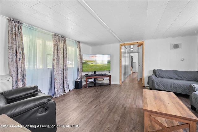 2243 Hubbard Rd, Charlotte, MI 48813 - living area featuring wood finished floors