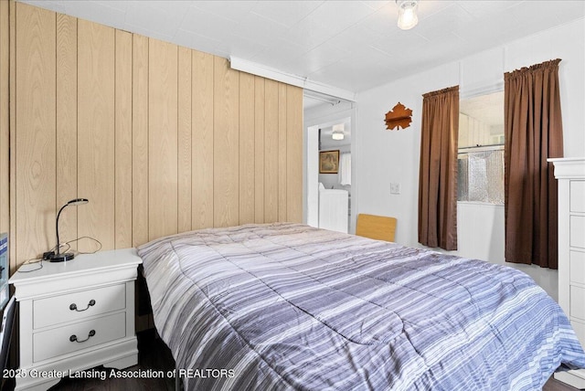 2243 Hubbard Rd, Charlotte, MI 48813 - bedroom with wooden walls