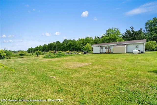 2243 Hubbard Rd, Charlotte, MI 48813 - view of green lawn