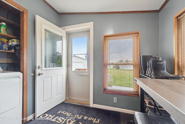 2744 Carlisle Hwy, Charlotte, MI 48813 - entryway with washer / clothes dryer, crown molding, and dark colored carpet