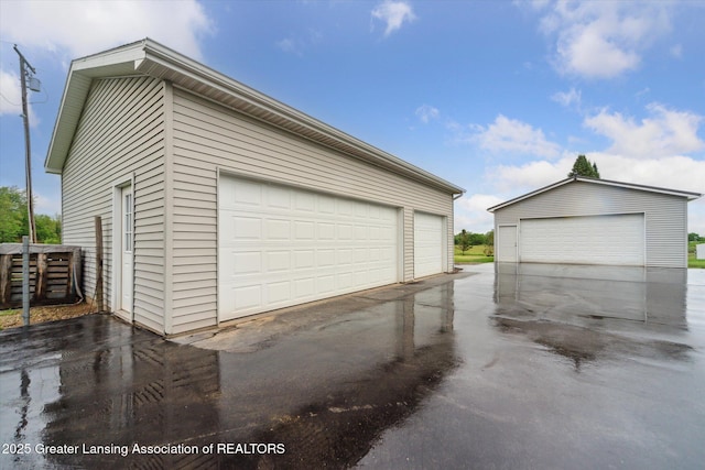 2744 Carlisle Hwy, Charlotte, MI 48813 - view of detached garage