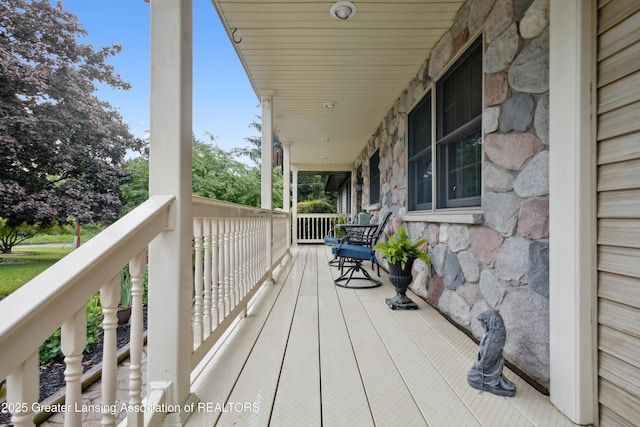 888 S Waverly Rd, Eaton Rapids, MI 48827 - view of wooden porch