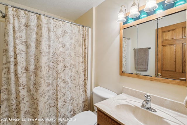 888 S Waverly Rd, Eaton Rapids, MI 48827 - bathroom featuring vanity and a shower with curtain