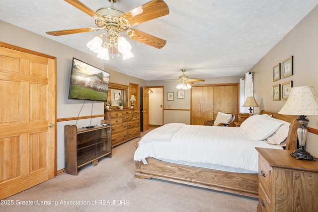 888 S Waverly Rd, Eaton Rapids, MI 48827 - bedroom featuring light carpet and a ceiling fan