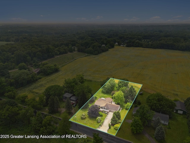 888 S Waverly Rd, Eaton Rapids, MI 48827 - aerial view of sparsely populated area with property boundaries highlighted and a forest