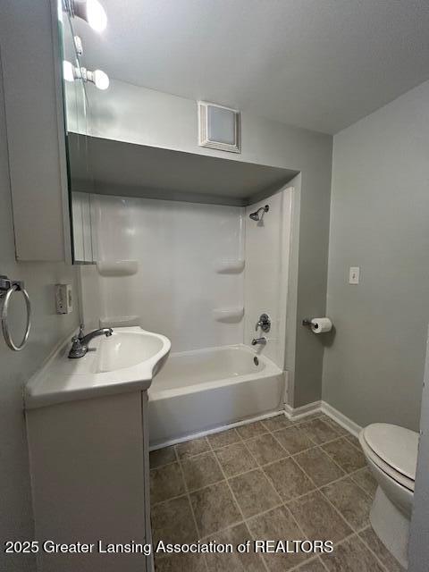1318 Massachusetts Ave, Lansing, MI 48906 - full bathroom with vanity and bathing tub / shower combination