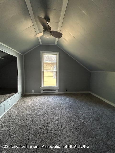 1318 Massachusetts Ave, Lansing, MI 48906 - additional living space with a ceiling fan, carpet floors, and vaulted ceiling