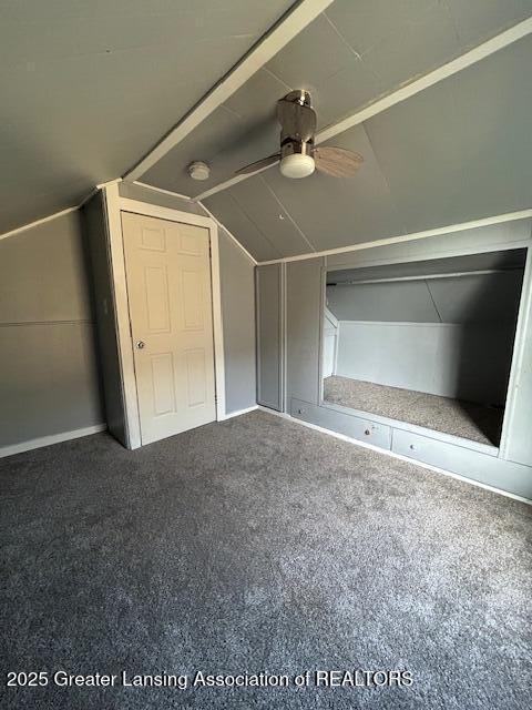 1318 Massachusetts Ave, Lansing, MI 48906 - bonus room featuring lofted ceiling, a ceiling fan, and carpet floors