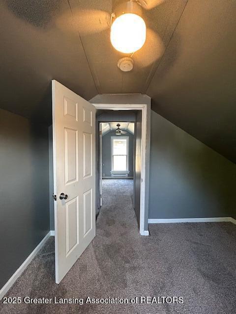 1318 Massachusetts Ave, Lansing, MI 48906 - hall featuring carpet and vaulted ceiling
