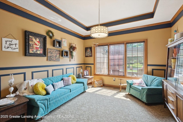 502 W Spring Meadows Ln, Dewitt, MI 48820 - living area featuring a tray ceiling, carpet, ornamental molding, and wainscoting