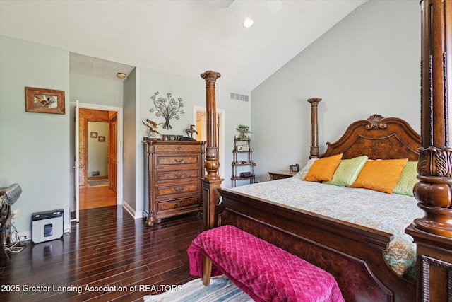 502 W Spring Meadows Ln, Dewitt, MI 48820 - bedroom with dark wood-style floors, vaulted ceiling, and recessed lighting