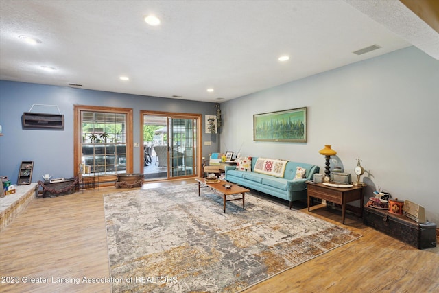502 W Spring Meadows Ln, Dewitt, MI 48820 - living area with wood finished floors and recessed lighting