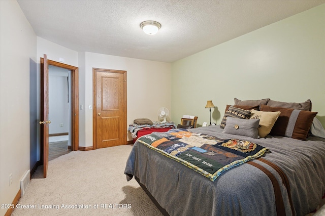 502 W Spring Meadows Ln, Dewitt, MI 48820 - bedroom featuring light colored carpet and a textured ceiling