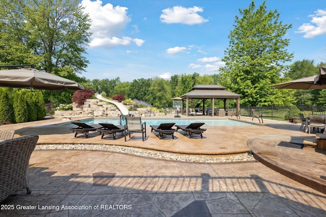 502 W Spring Meadows Ln, Dewitt, MI 48820 - view of patio featuring a gazebo and view of scattered trees