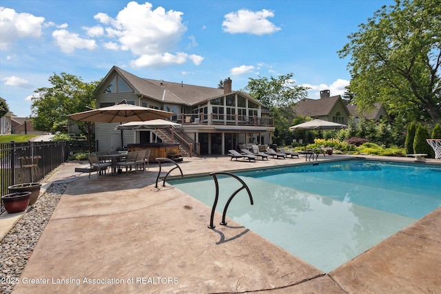 502 W Spring Meadows Ln, Dewitt, MI 48820 - view of swimming pool with a patio area, stairs, a diving board, and a sunroom