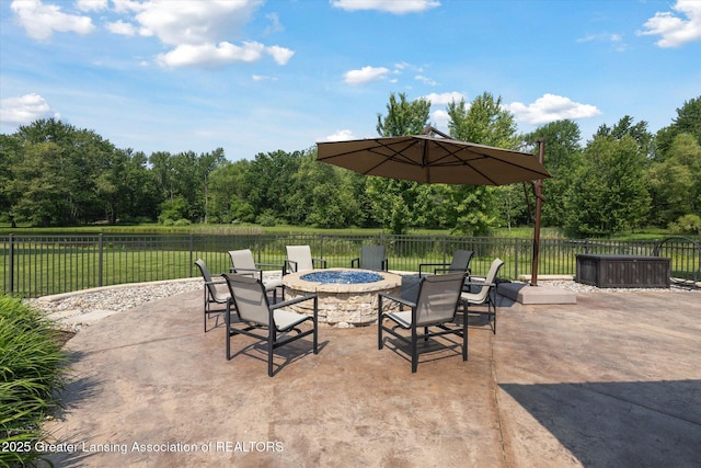 502 W Spring Meadows Ln, Dewitt, MI 48820 - view of patio with a fire pit